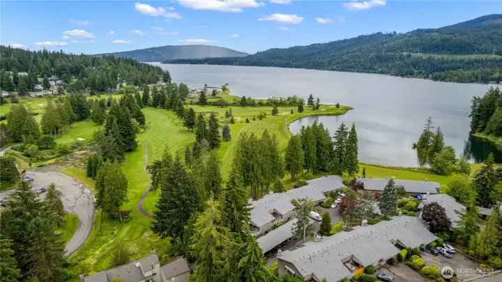 Surrounded by greenery and open space, the building enjoys a location near golf, trails, and community amenities.