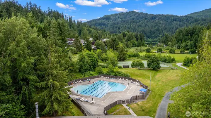 Outdoor pool area provides a place to cool off, unwind, or gather with friends and neighbors during the warmer months.