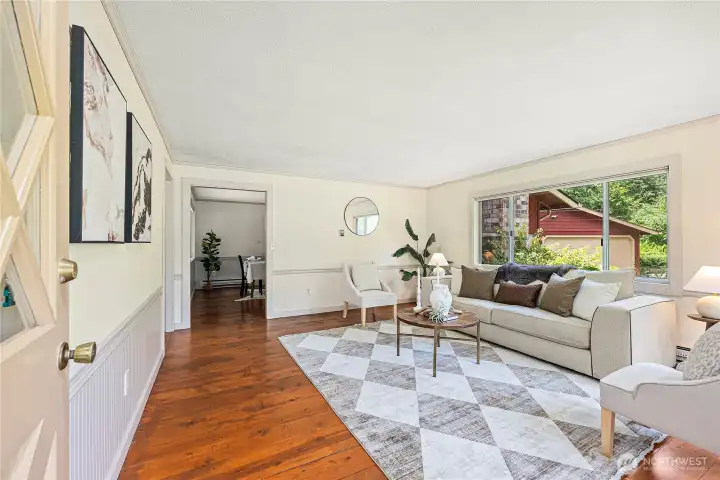Covered front porch entry into a beautiful large family room