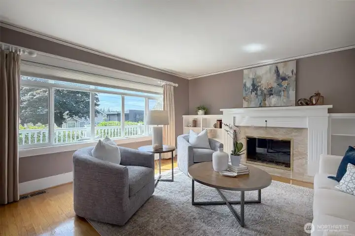 Hardwoods through out and gas fireplace complete this lovely living room.