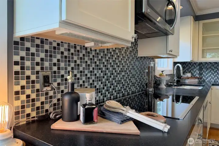 Beautiful tile work in this lovely kitchen.