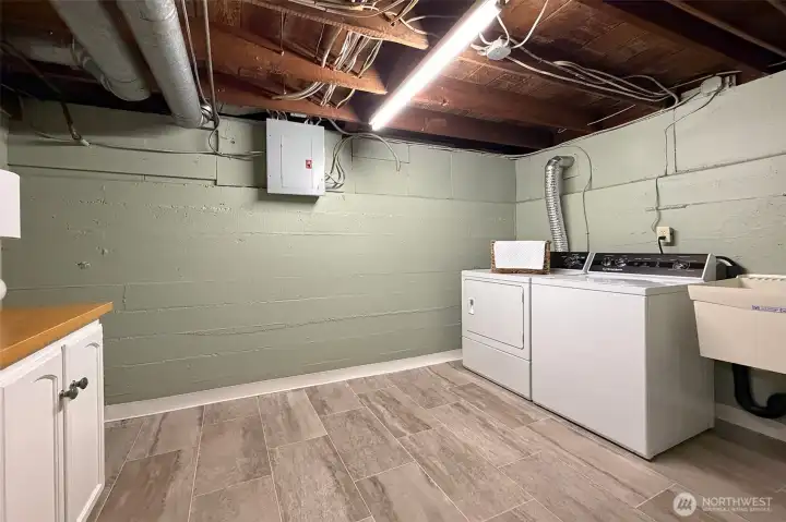 Sought after huge laundry room with new flooring.