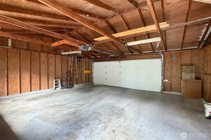 A sought after over sized 2 car garage off alley! Great for extra storage and your cars too!