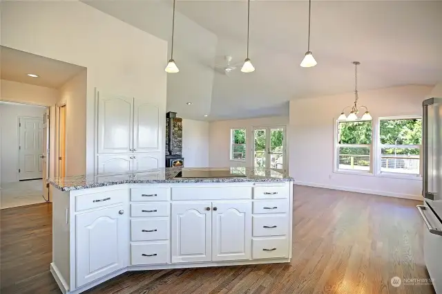 Great room freshly painted.  Down hall to the left is a powder room that is brand new, plus the laundry room at end of hallway leading to garage.