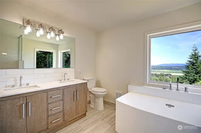 Stunning views! Large soaking tub and brand new walk in shower.