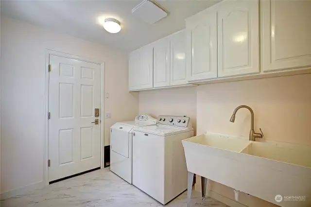 Large Laundry Room. New flooring.  All appliances stay.