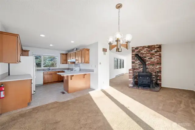 Wood stove with insert in dining room.