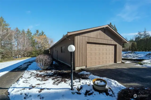 Oversized 2 car garage w/sink, newer hot water tank and furnace.