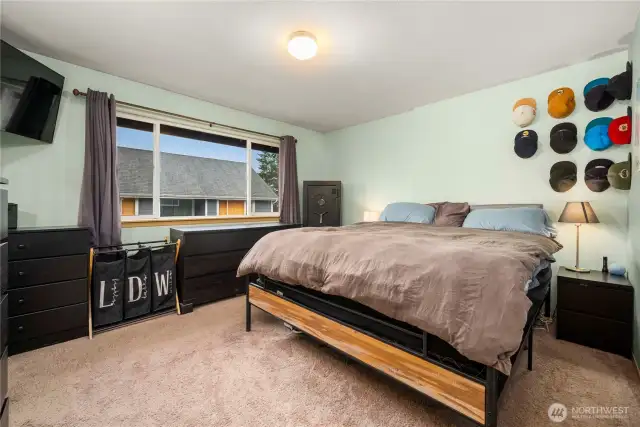 Primary bedroom includes a walk-in closet & ensuite