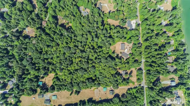 Welcome to 2650 S East Camano Drive.  12.88 subdividable acres complete w/ a 2,784sqft Marlette home & 2,698sqft shop!
