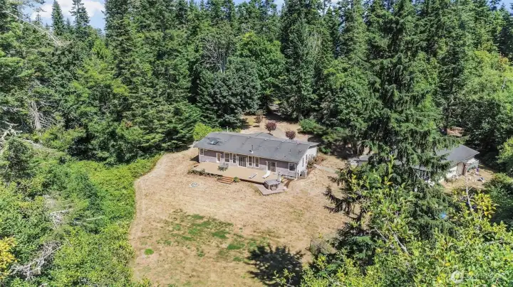 Welcome to 2650 S East Camano Drive.  12.88 subdividable acres complete w/ a 2,784sqft Marlette home & 2,698sqft shop!