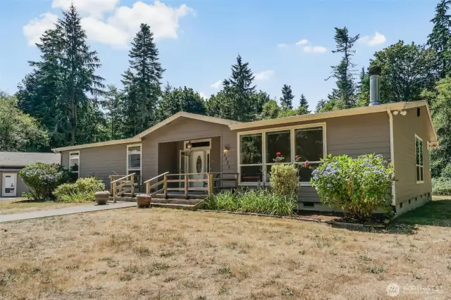 Semi-circular driveway allows for easy entry and exit to your 12.88 subdividable acres, 2,784sqft 3 bedroom home and 2,698sqft shop.