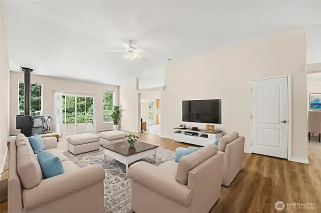 Virtually Staged. You are greeted by the spacious Great Room when you enter the home.