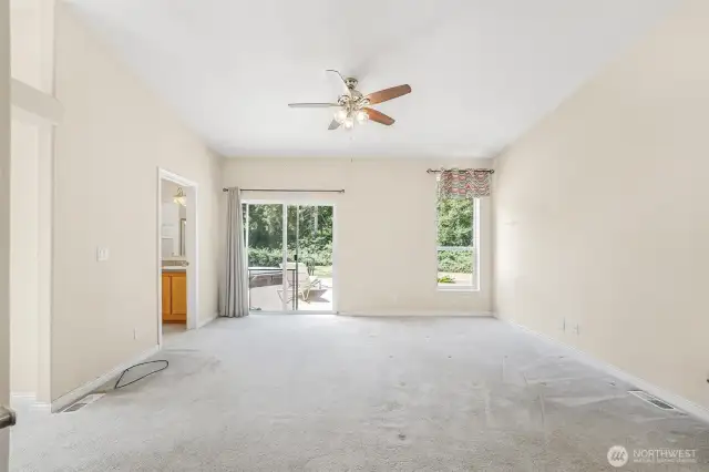 The Primary Bedroom is complete with 2 walk-in closets, 5 piece ensuite, retreat room/office and deck access close to the hot tub.