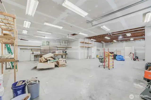 The Shop/Garage dreams are made of! 38x71 (2,698sqft) 4-Bay detached garage/shop with full 10x25 insulated storage room and a 38X25 finished and insulated hobby room with sliding glass doors to its own patio.  220 outlets, air compressor and a 440 outlet in the garage. Pellet stove is installed in the insulated hobby room and the room is plumbed for a potential bathroom.