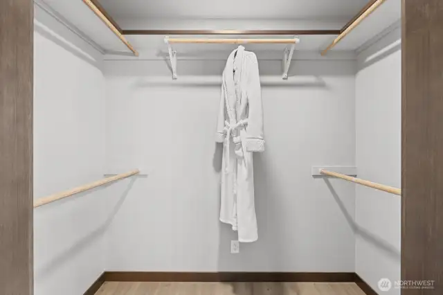 Primary walk in closet from bathroom