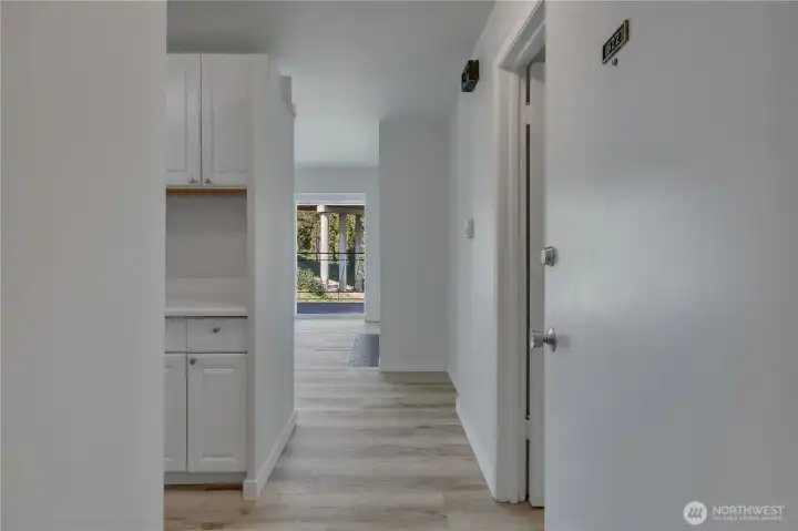 The home has been updated with durable new LPV floors and fresh interior paint, creating a clean and inviting look.