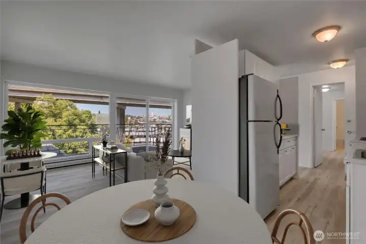 A cozy dining nook beside the living room, where you can enjoy meals with a view.