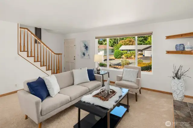 Cozy up with a book in cute living room.