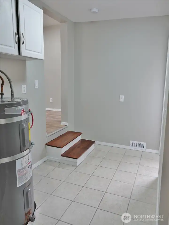 Laundry Room w/ tile floors.