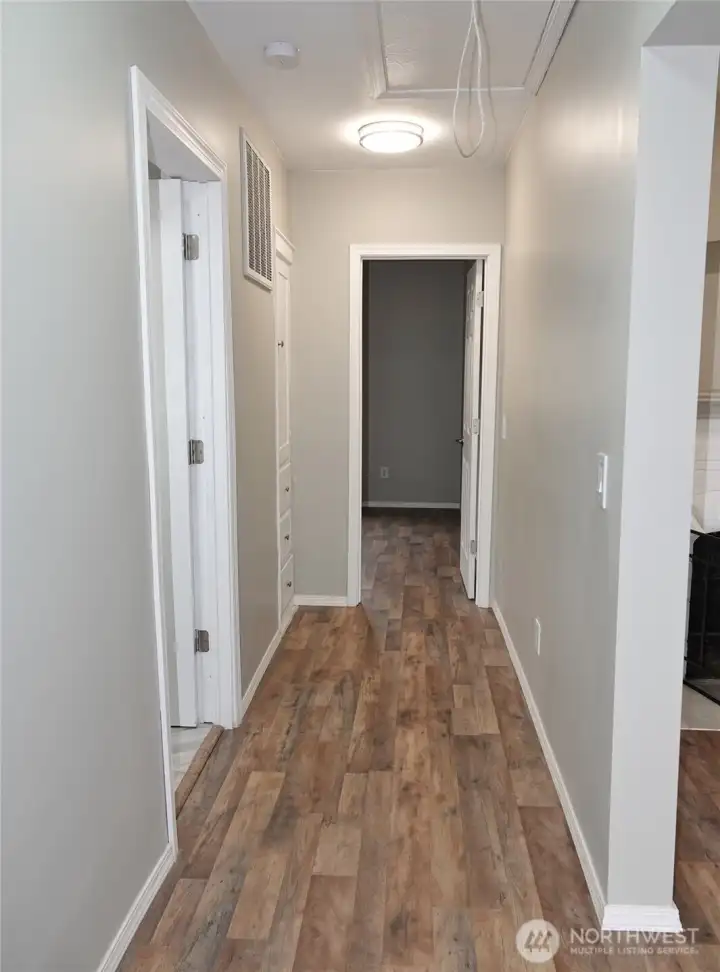 Hallway leading to the 2 bedrooms and bathroom.