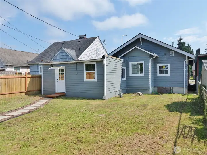 Rear view of the Home and Backyard.