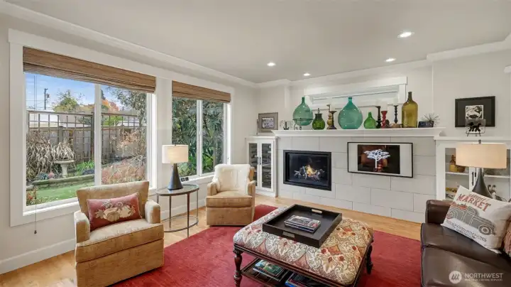 Custom blinds throughout the home stay.  Reimagined Family Room with new gss fireplace, wine storage, Portrate TV, spot lighting and more.  Whole house speaker system with separate volume controls throughout the home - including the garage!