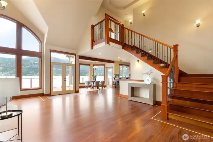 A spacious entry and beautiful Brazillian cherry floors welcomes guests.