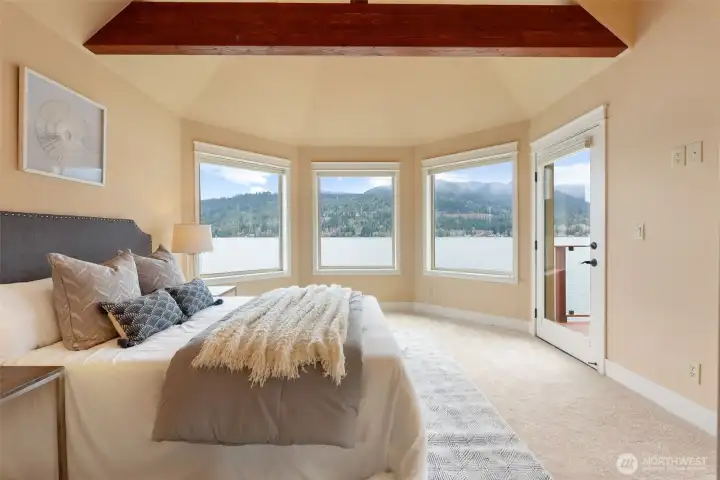 The primary suite ensures the focus in on the view. Brand new carpet throughout the suite.