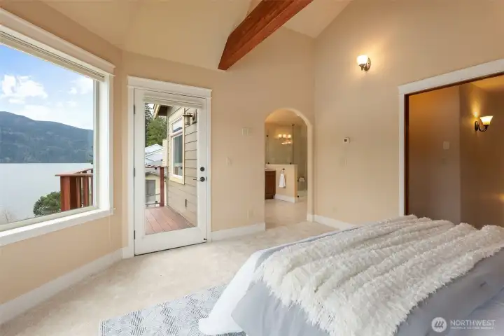 The primary enjoys a private deck.