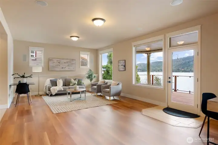 The downstairs suite offers a second living space with Luxury Vinyl Flooring