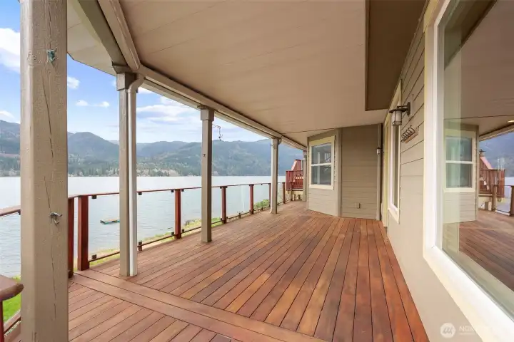 The lower deck offers access from the lower suite and includes an outdoor shower.