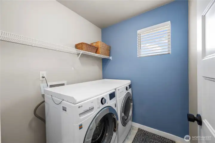 Convenient upstairs laundry near bedrooms.