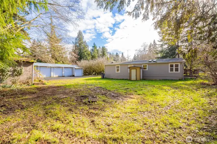 This spot would be perfect for a fire pit, gazebo, or even possibly more storage/parking. What would you do?