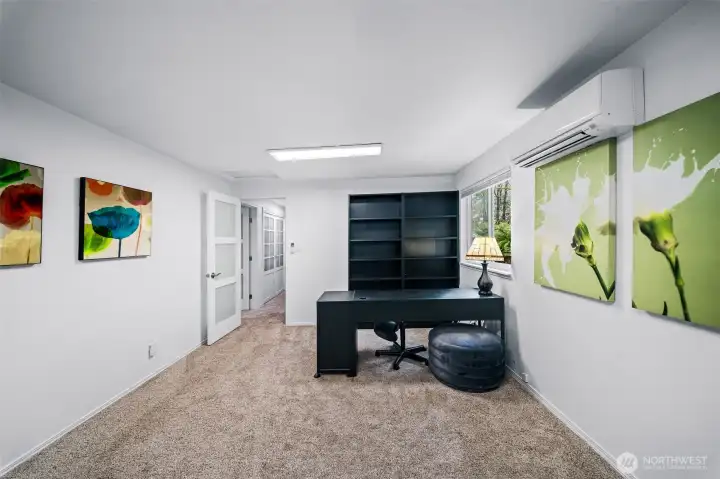 This bonus room currently serves as an office, but has many possibilities