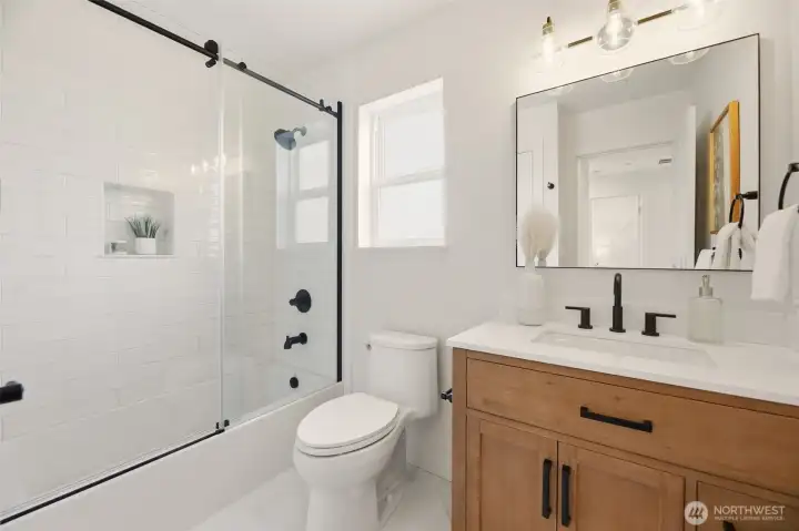 The upper level hall bath is also a complete down-to-stud remodel! Yup, everything is new. And, high-quality materials used throughout!