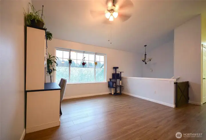 A second view of the living room, emphasizing its spacious and functional design.