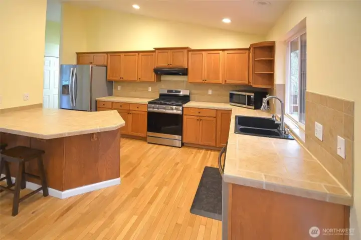 Spacious kitchen offering abundant counter space, storage, and everyday functionality.