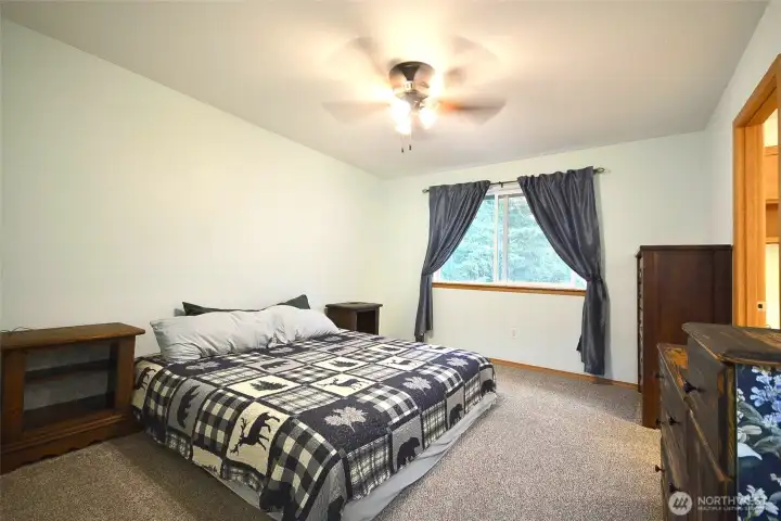 Well-sized primary bedroom with room for additional furnishings and everyday comfort.