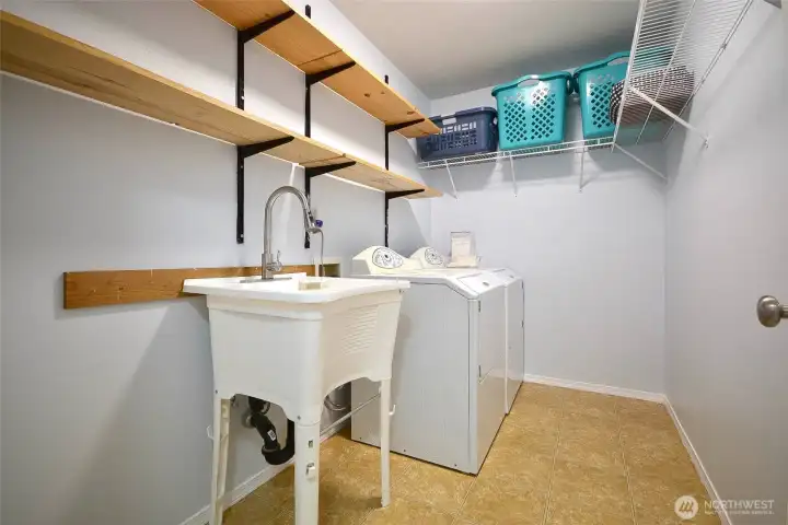 Generous laundry space with practical layout for all your household needs.