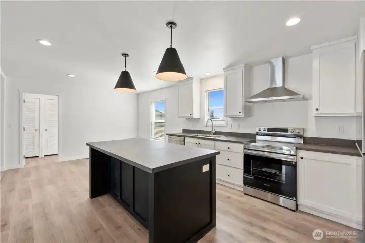 Gorgeous two-toned kitchen cabinetry w/extra storage