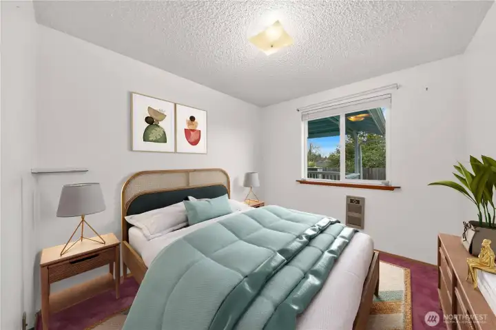 Bright second bedroom overlooking the backyard - Virtually staged