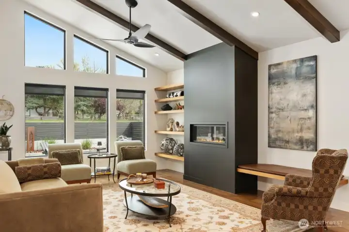 Living room with gas fireplace and custom shelving