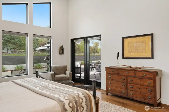 Primary suite with private doors to covered patio