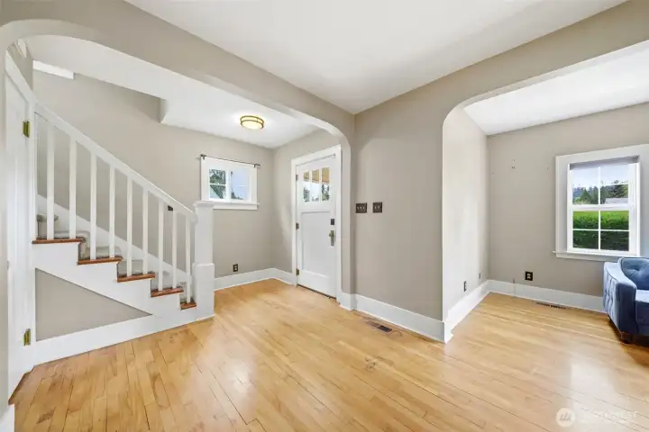 Wood floors, arched doorways and thick trim add lots of charm.
