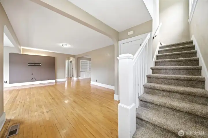 Wood floors and banister.