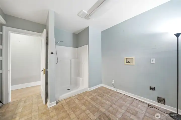 Main floor 3/4 bath and laundry room.