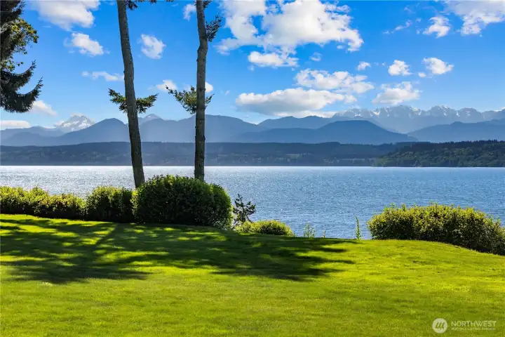 Unobstructed views of the Olympic Mountains and so much room to garden and play.  .