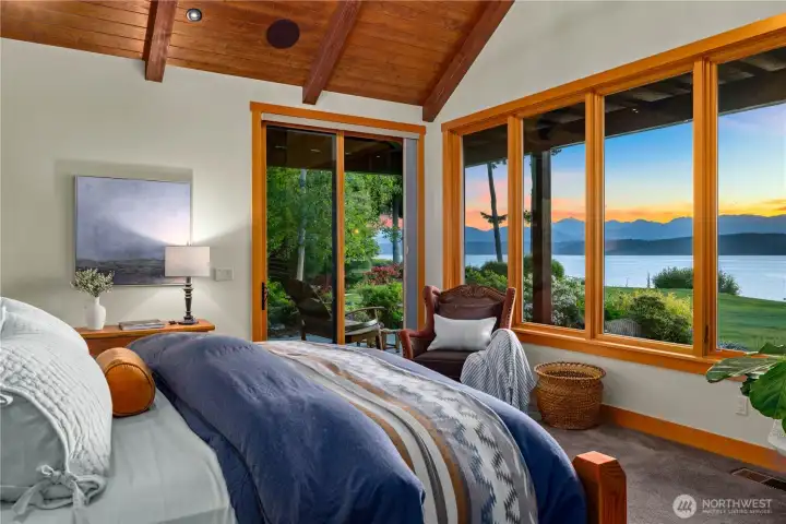 Glorious views from the primary and private access to the covered and heated outdoor living area(s).