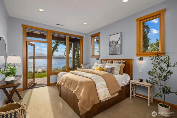 Main floor guest bedroom with private ensuite bath.